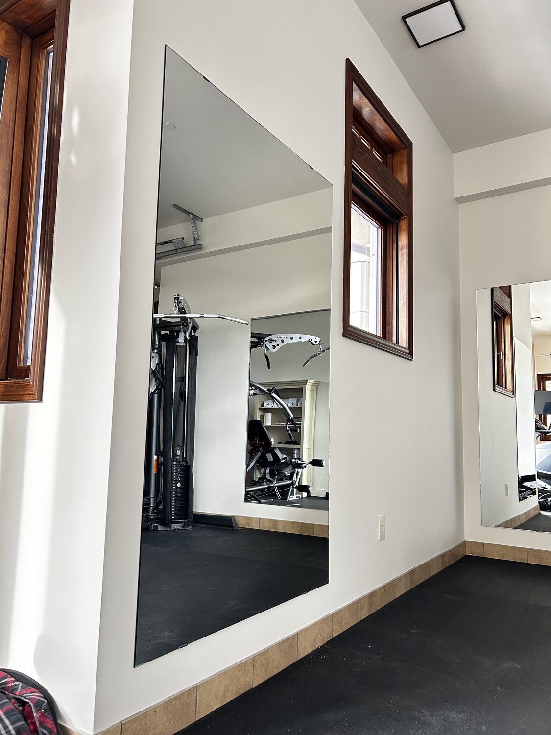 Full-wall home-gym mirror