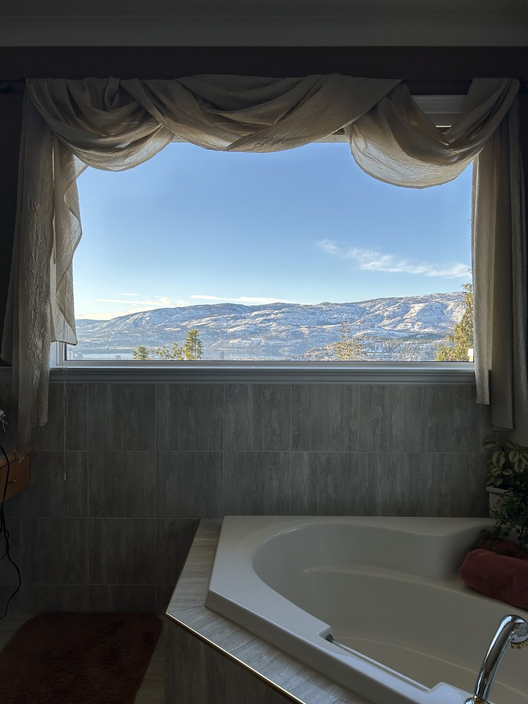 Custom picture window framing the mountains